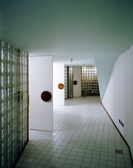 House Waves of Glass and Clouds of Metal