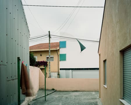 House with an Inverted Roof 