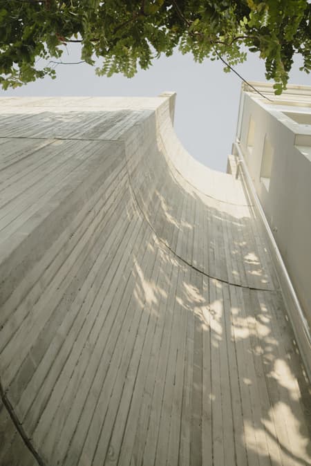 Vertical Tube House - Kam and Ly House